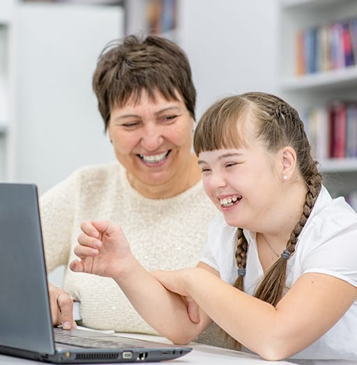 Smiling girl on laptop